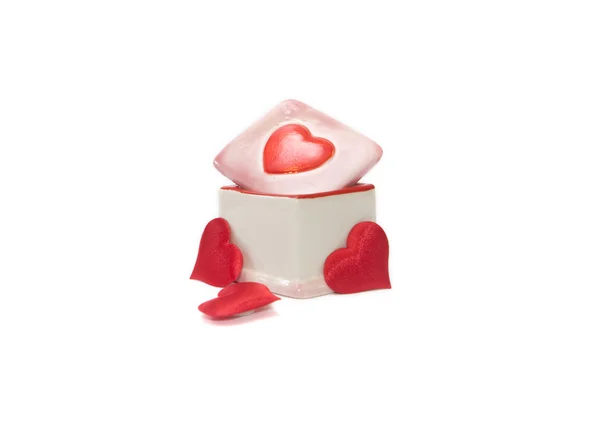 Porcelain box and three red heards Valentine — Stock Photo, Image