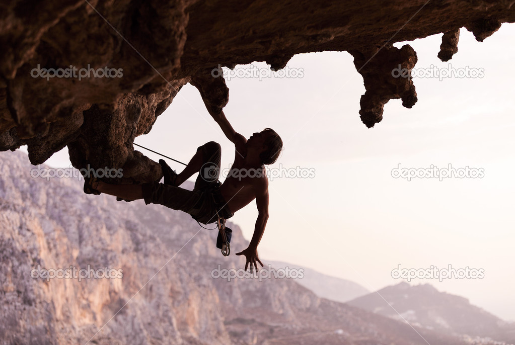 Silhouette of a rock climber