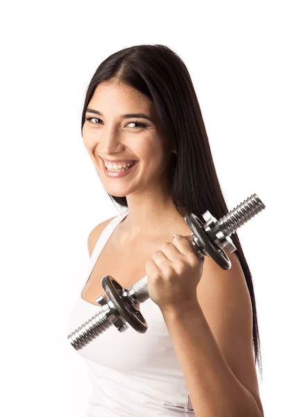 Hermosa chica de fitness haciendo ejercicio con pesas sobre blanco —  Fotos de Stock