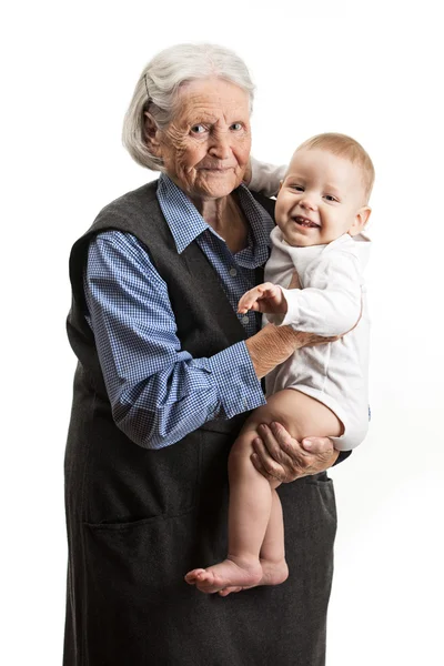 Porträt einer Großmutter, die ihren Enkel hält — Stockfoto