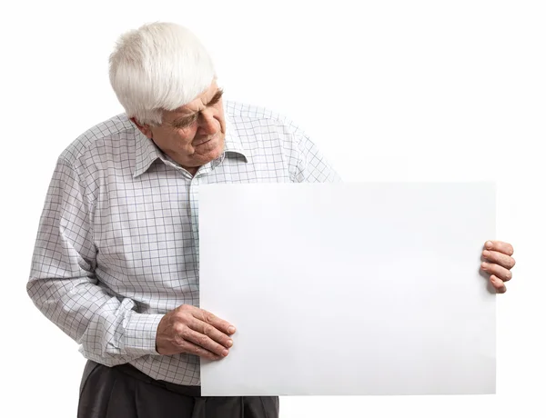 Mature man holding a blank billboard over white — Stock Photo, Image