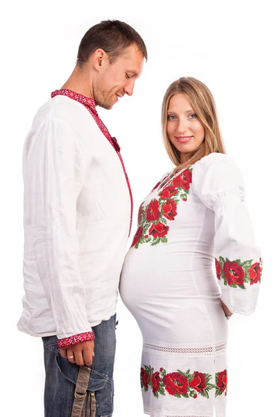 Young couple in Ukrainian style costumes on white — Stock Photo, Image