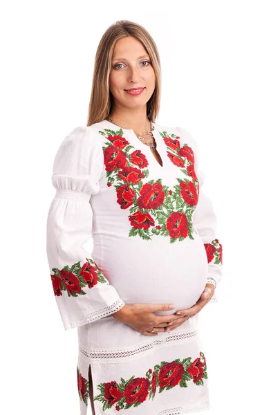 Vackra gravid kvinna i ukrainska stil klänning — Stockfoto