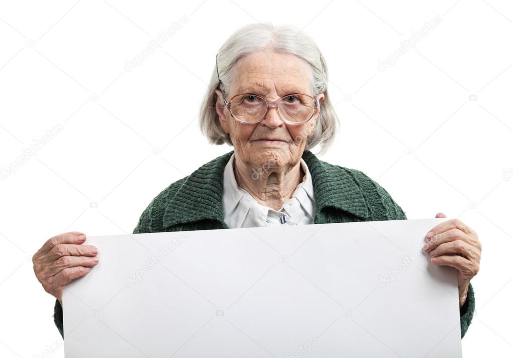 Happy elderly lady holding blank sheet in hand