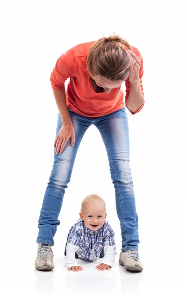 Young Caucasian mother and baby boy playing Stock Photo