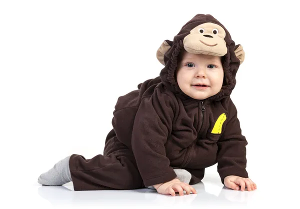 Menino vestido com traje de macaco sobre branco — Fotografia de Stock