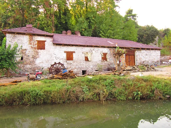 Water mills, farm house.