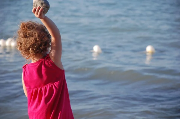 Portrait of the girl child at the sea. — Stock Photo, Image