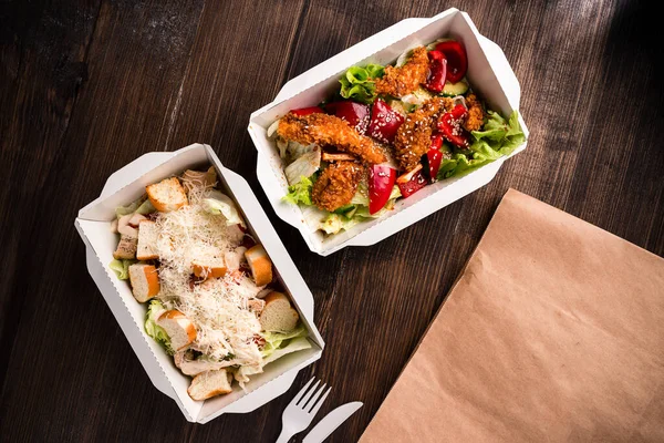 two salads in eco thermo box, Healthy food delivery. Take away food service Nutrient rich healthy low fat food in takeaway meal box with copy space