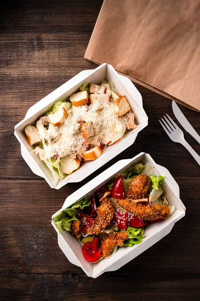 two salads in eco thermo box, Healthy food delivery. Take away food service Nutrient rich healthy low fat food in takeaway meal box with copy space