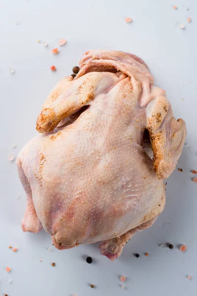 large raw turkey on a white background, Fresh raw chicken, Whole raw turkey