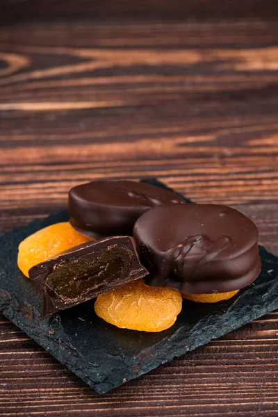Dried Apricots Dark Chocolate Chocolate Pile Apricots — Stock Photo, Image