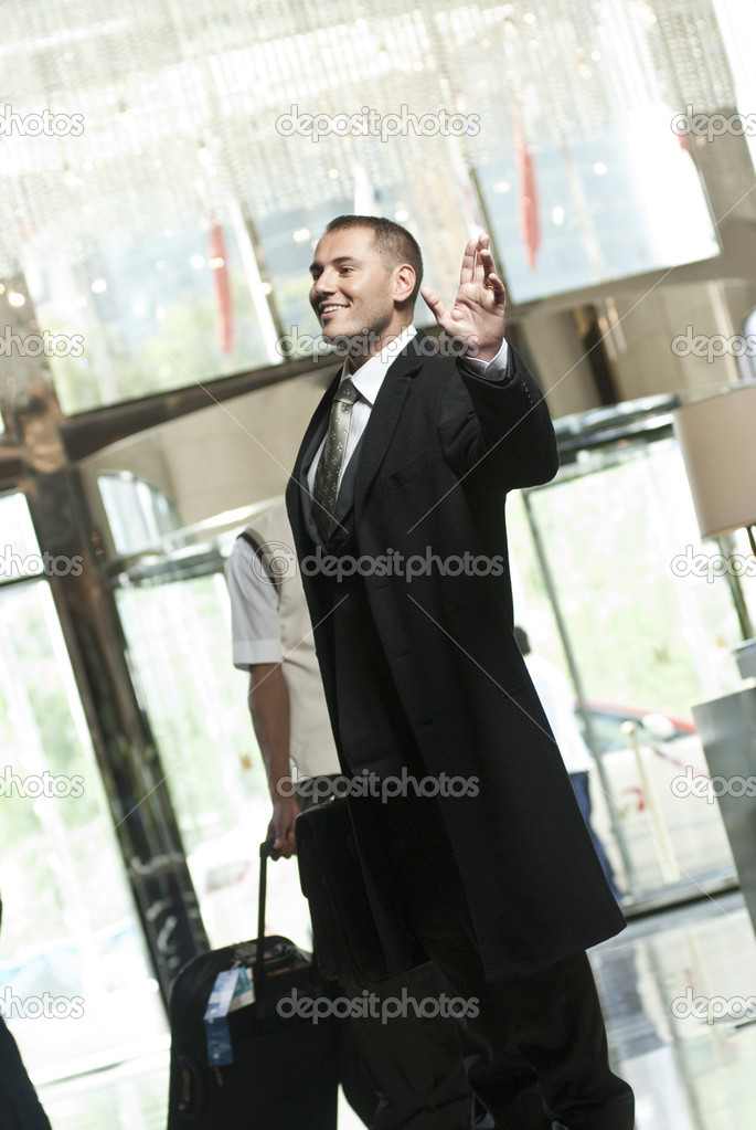 Business person arrives to the hotel