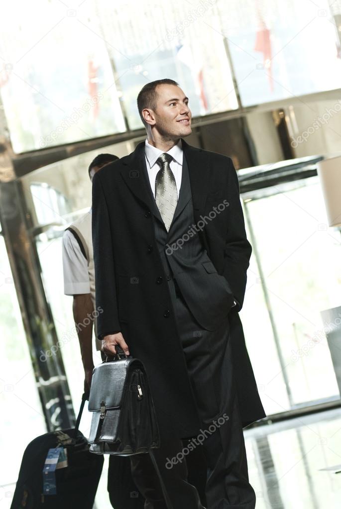 Business person arrives to the hotel