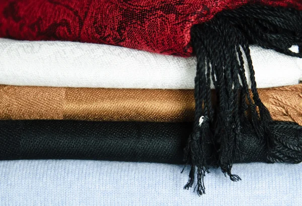 Picture of different rolled fabrics set up in stack. — Stock Photo, Image