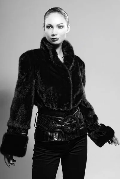 Studio portrait European female cute model in furs — Stock Photo, Image