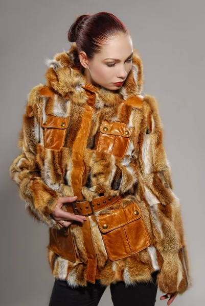 Studio portrait European female cute model in furs — Stock Photo, Image