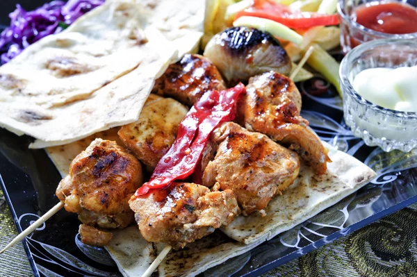 Arabic mixed barbeque plate with sauces and multiple garnish — Stock Photo, Image