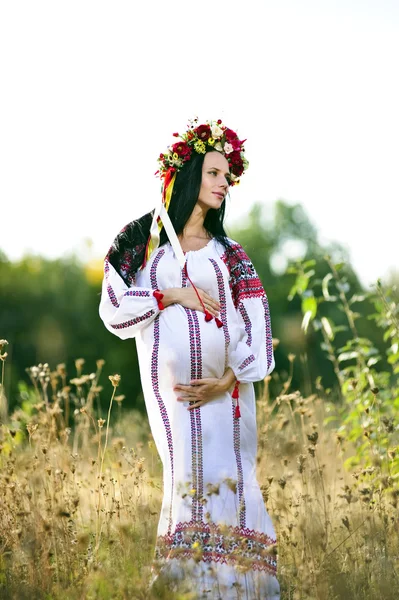 Outdoor portrait of beautiful pregnant Slav woman Royalty Free Stock Images