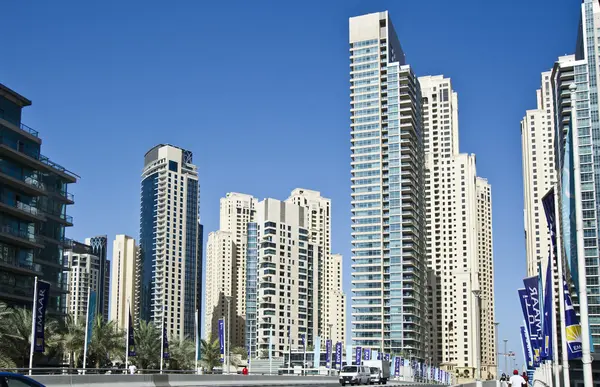 DUBAI, UAE - FEBRUARY 22: View of modern skyscrapers in Dubai Marina on February 22, 2013 in Dubai, UAE. Dubai Marina - artificial canal city, carved along a 3 km stretch of Persian Gulf shoreline. — Stock Photo, Image