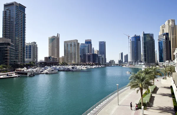 DUBAI, UAE - FEBRUARY 22: View of modern skyscrapers in Dubai Marina on February 22, 2013 in Dubai, UAE. Dubai Marina - artificial canal city, carved along a 3 km stretch of Persian Gulf shoreline. — Stock Photo, Image