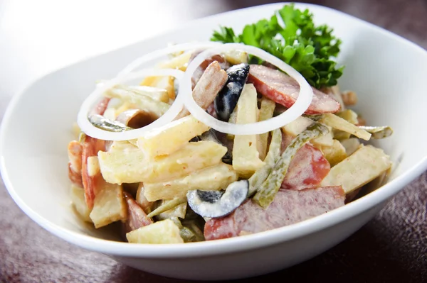 Traditional Italian salad topped with cheese and mushrooms — Stock Photo, Image