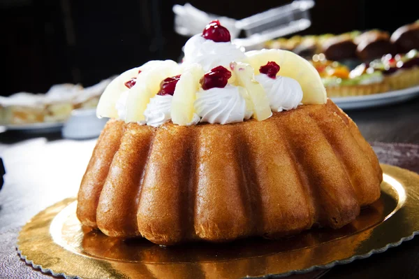 Plate of Italian cake topped with cream — Stock Photo, Image