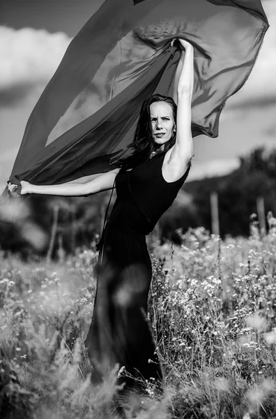 Picture of sexy yang dark haired women with red fabric black and white — Stock Photo, Image