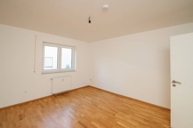Cozy studio apartment design with bedroom and living space. Hotel room panoramic window, double bed, sofa and coffee table. Urban apartment concept