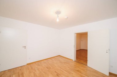 Cozy studio apartment design with bedroom and living space. Hotel room panoramic window, double bed, sofa and coffee table. Urban apartment concept