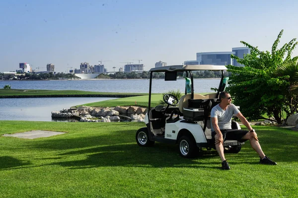 Adult Man Golf Car Field — 图库照片