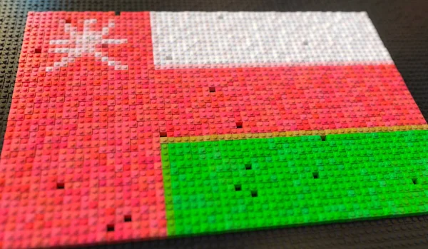 Іграшкові цеглини утворюють прапор Оману, концептуальний 3d рендеринг — стокове фото
