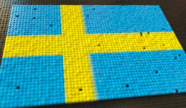 Bandeira da Suécia feita com blocos de brinquedo de plástico, conceitual 3d renderização — Fotografia de Stock