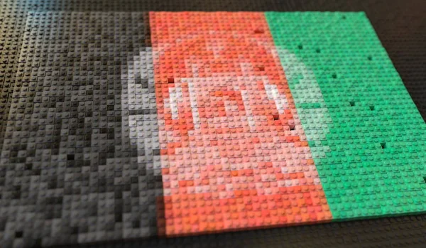 Spielzeugblöcke aus Plastik komponieren Flagge Afghanistans, konzeptionelle 3D-Darstellung — Stockfoto