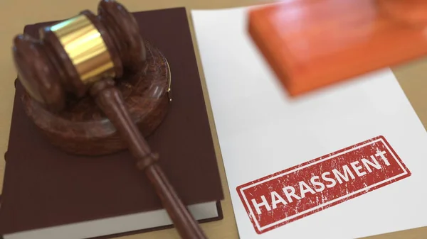 Wooden gavel and HARASSMENT stamp on the paper. Court related 3d rendering — Stock Photo, Image