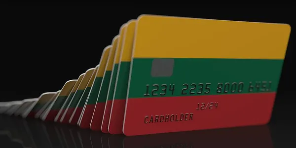 Domino effect, fallen credit cards with flags of Lithuania. Fictional data on card mockups. Banking collapse conceptual 3d rendering