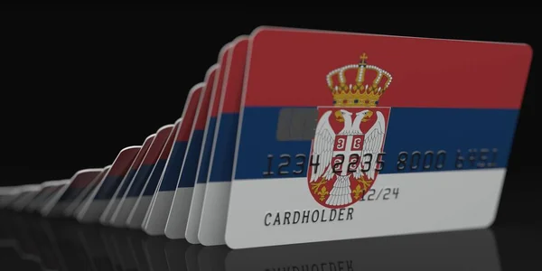 Domino efekt, padlé kreditní karty s vlajkami Srbska. Fiktivní data o maketách karet. Bankovní kolaps konceptuální 3D vykreslování — Stock fotografie