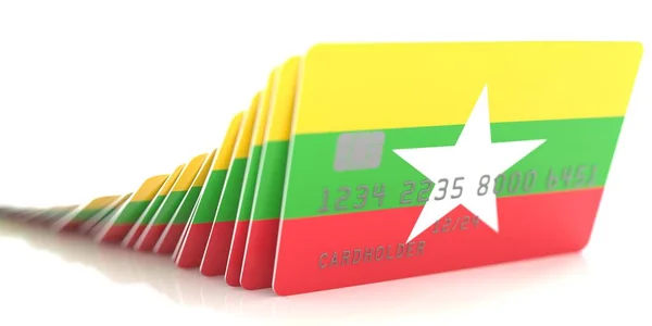 Linje av fallna kreditkort med flaggor av Myanmar på vit bakgrund, 3D-rendering — Stockfoto
