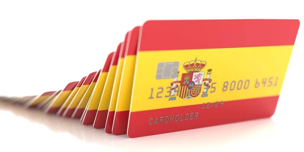 Effetto domino con caduta delle carte di credito con bandiere della Spagna. Rendering concettuale 3d — Foto Stock