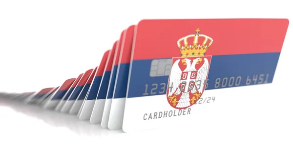 Linha de cartões de crédito caídos com bandeiras da Sérvia em fundo branco, renderização 3d — Fotografia de Stock