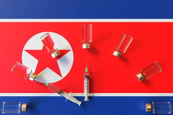Kuzey Kore bayrağı ve aşı şişeli şuruplar. Aşılama zamanı konsepti 3B oluşturma — Stok fotoğraf