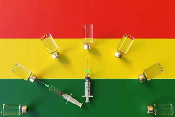 Glazen flacons en spuiten op de vlag van Bolivia. Conceptuele 3D-rendering met betrekking tot vaccinatie — Stockfoto