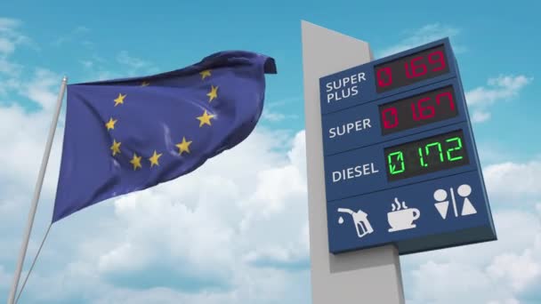 Flaga UE i stacja benzynowa podpisują się pod rosnącymi cenami paliwa. Konceptualna animacja 3D — Wideo stockowe