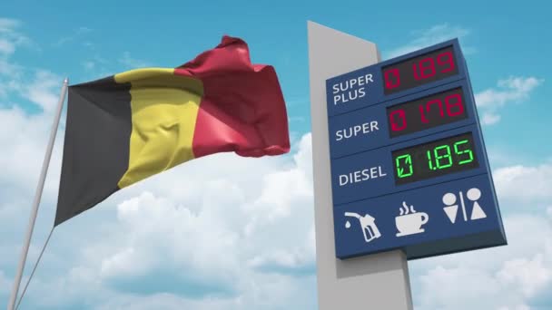 Benzinkút tábla emelkedő üzemanyagárakkal és nemzeti zászlóval Belgium, koncepcionális 3D animáció — Stock videók