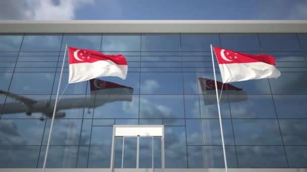 Banderas de Singapur en el aeropuerto y avión comercial de aterrizaje — Vídeos de Stock