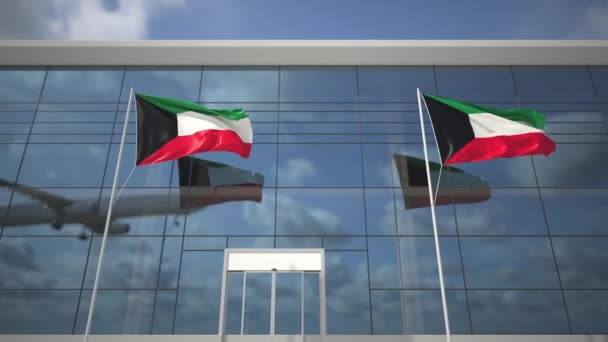Флаги Кувейта в аэропорту и посадка коммерческого самолета — стоковое видео