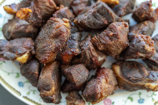 Plate of deep fried beef grilled ready to eat — Stockfoto
