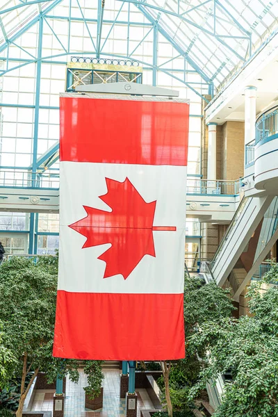 Canadian National Maple Leaf flag hanging in a shopping mall — Fotografia de Stock