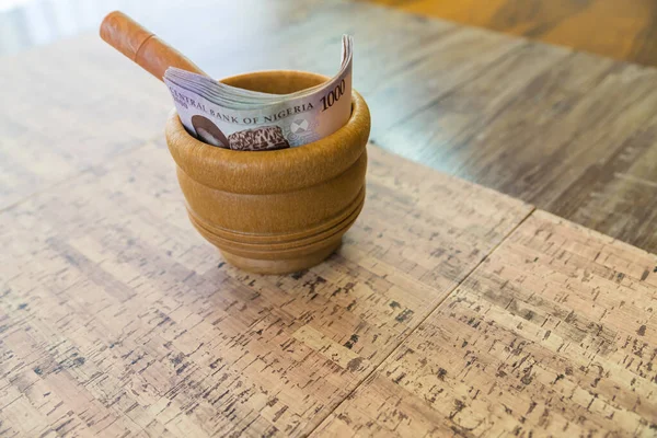 Nigerian Naira Notes in Mortar with Pestle - Financial Concept — Photo