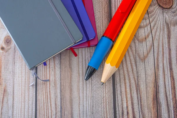 Pile Journals Notebooks Giant Pen Pencil — Stockfoto